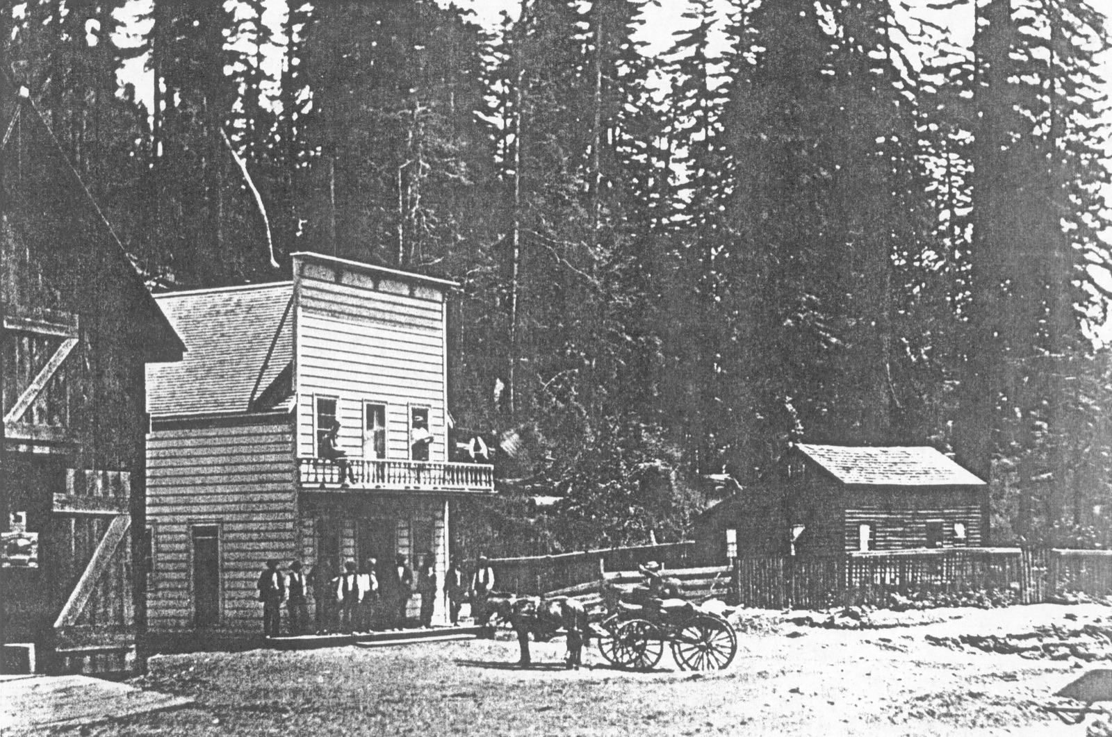 Townsfolk gathered outside Hiram Epperly's wooden saloon in Guerneville, 1875